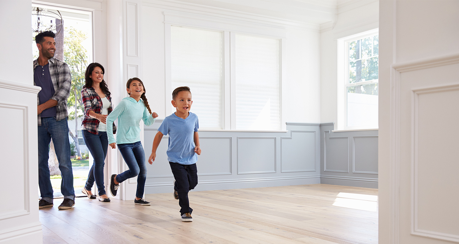 family entering a new home